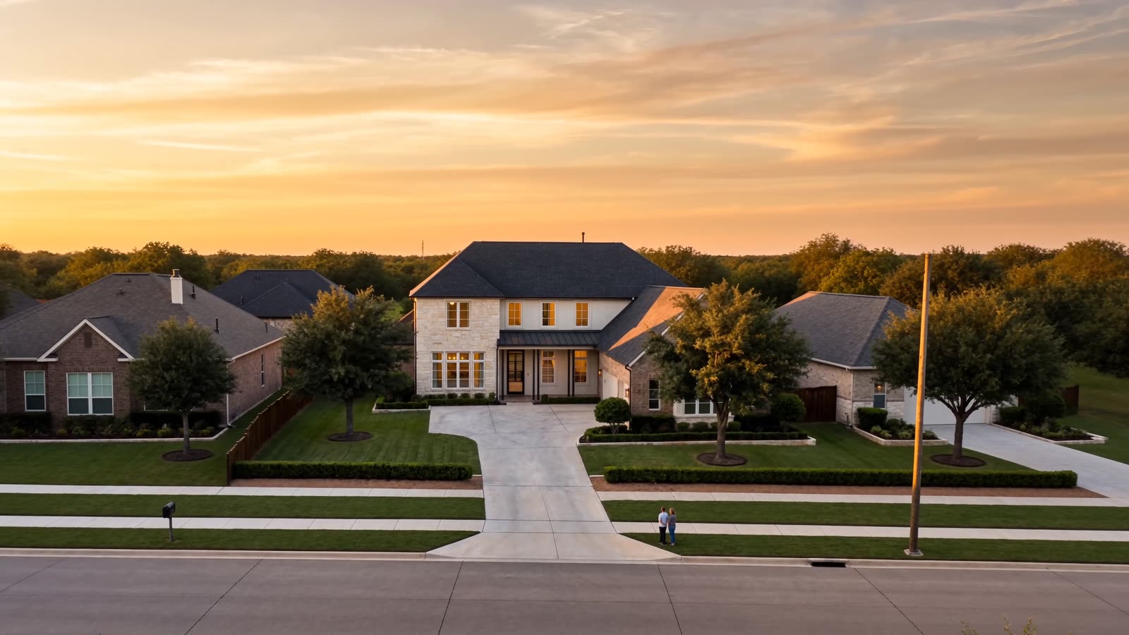 Completed architectural shingle roof replacement on a two-storey Texas home.